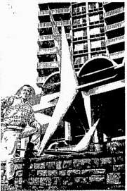 1965, Bill Jamison stands with his sculpture, Flight
